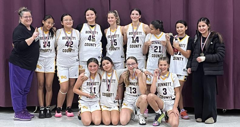 Photo submitted The Bennett County middle school girls basketball team won the Western Great Plains Conference tournament in White River over the weekend.