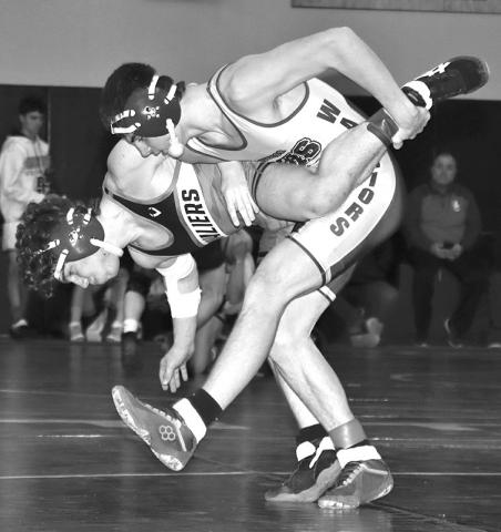 Photo by Mandy Scherer Tel Gropper takes down Westin Edwards during regional wrestling.