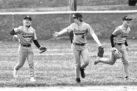 Photo by Marj Oleske Baseball is a family sport. Pictured are cousins Maddux Risse, Jordan Risse, and Hayden Risse doing what their family is great at... baseball.