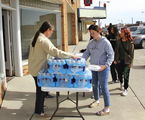 Photo by Jacob Waln The Higher Ground Baptist Church could not have their scheduled activities due to some construction being done on the church. So they decided to spend the extra time by giving to the students of Bennett County High School, with a free Hot Dog Lunch last Thursday, March 21.