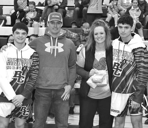 Photo by Mandy Scherer Bennett County Wrestling Parent’s were honored Saturday, February 10. Tel and Tyce Gropper honor their parent’s Gabe and Jami.