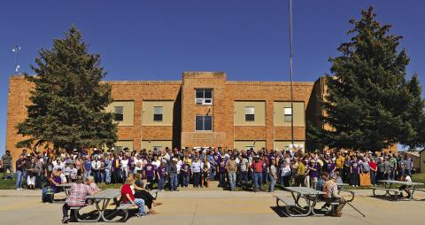Photo by Mandy Scherer Bennett County High School alumni gathered in front of the old high school on Saturday, May 18, to say goodbye to the old school built in 1937. Activities were held at the Heritage Center earlier in the day where 261 people signed in from 11 states. Alumni represented every decade since the 1940s with two from the 1940s and seven from the 1950s. A meal and music was held afterward in the old gym.