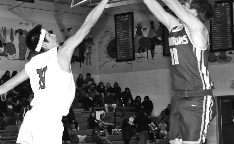 Photo by Taylor Risse Shooter Frederick put up six points against Pine Ridge last Tuesday in the first round of region 7A play.