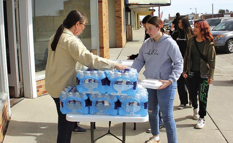 Photo by Jacob Waln The Higher Ground Baptist Church could not have their scheduled activities due to some construction being done on the church. So they decided to spend the extra time by giving to the students of Bennett County High School, with a free Hot Dog Lunch last Thursday, March 21.
