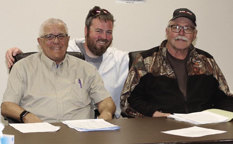 Photo by Tim Huether New Martin City Council members taking the oath of office May 8 were, from left, Larry Gauer, Tyler Nollett and Randy Kocourek.